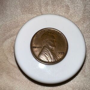 Coin Paperweight with White Base